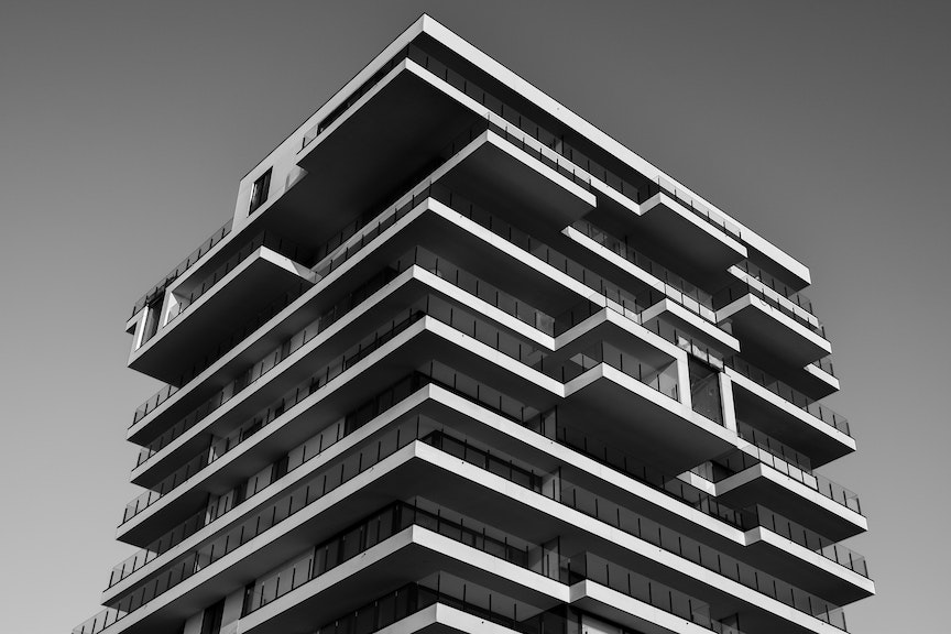 how to build a site architecture - photo of a black and white building structured and stacked on top of each other