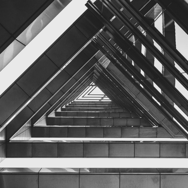 how to build a site architecture - photo of a black and white building structured and stacked on top of each other