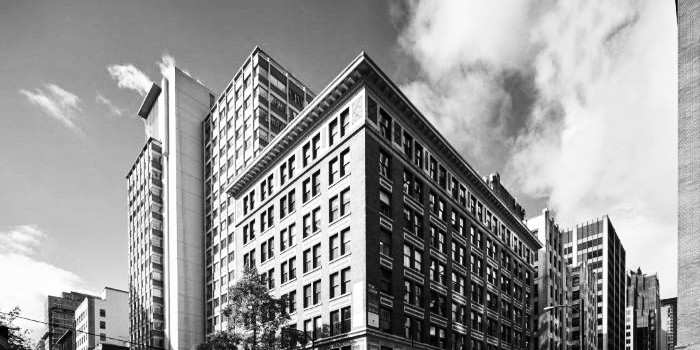 how to build a site architecture - photo of a black and white building structured and stacked on top of each other