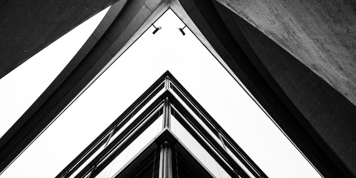 how to build a site architecture - photo of a black and white building structured and stacked on top of each other